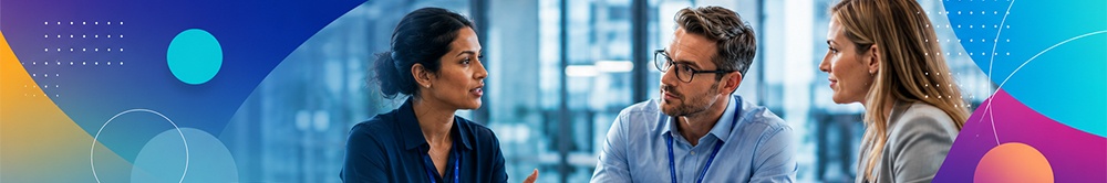 Three professionals discussing ideas in a collaborative meeting